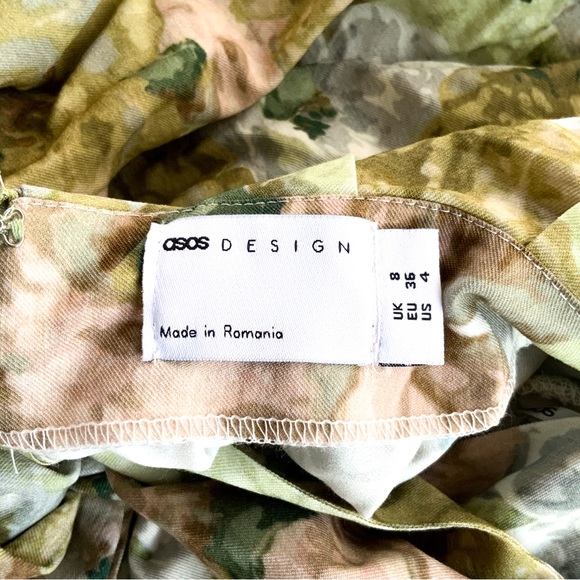 ASOS DESIGN Halter mini dress with bow back in floral print - Picture 9 of 14